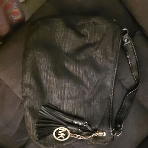 Michael Kors Black Satchel with  Tassel And Emblem